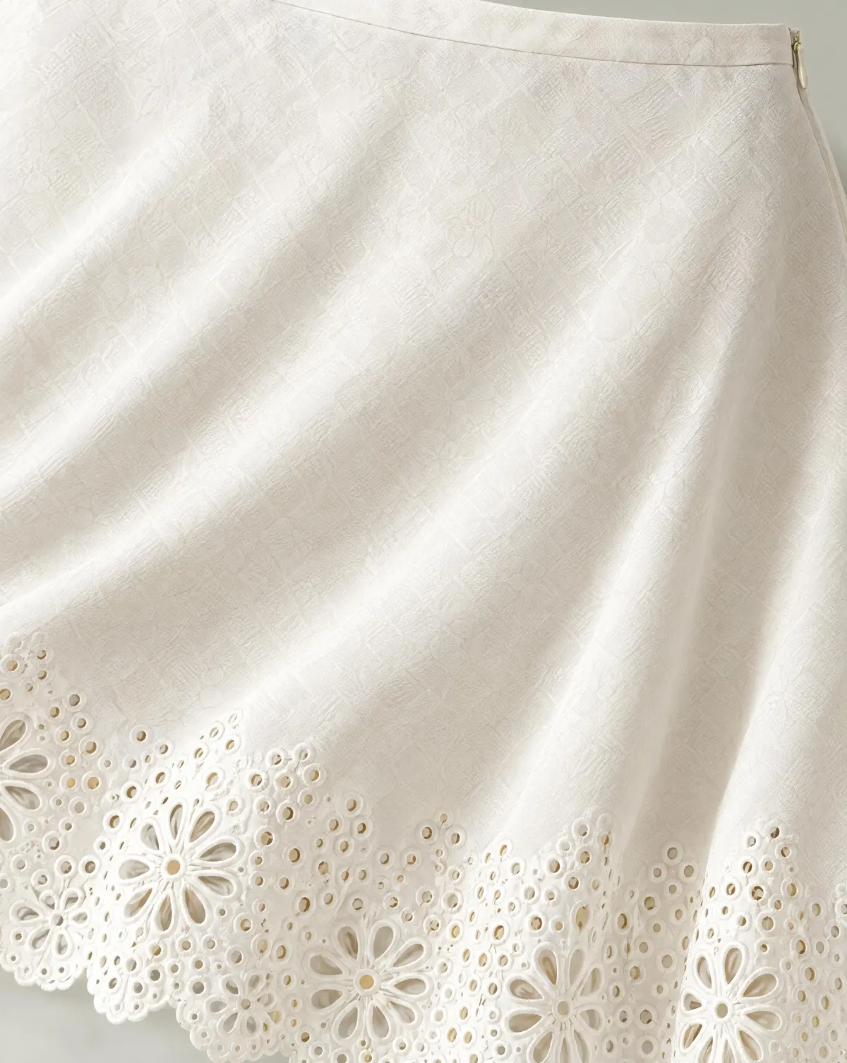 Close-up of the bloom bias midi skirt embroidery and finishing