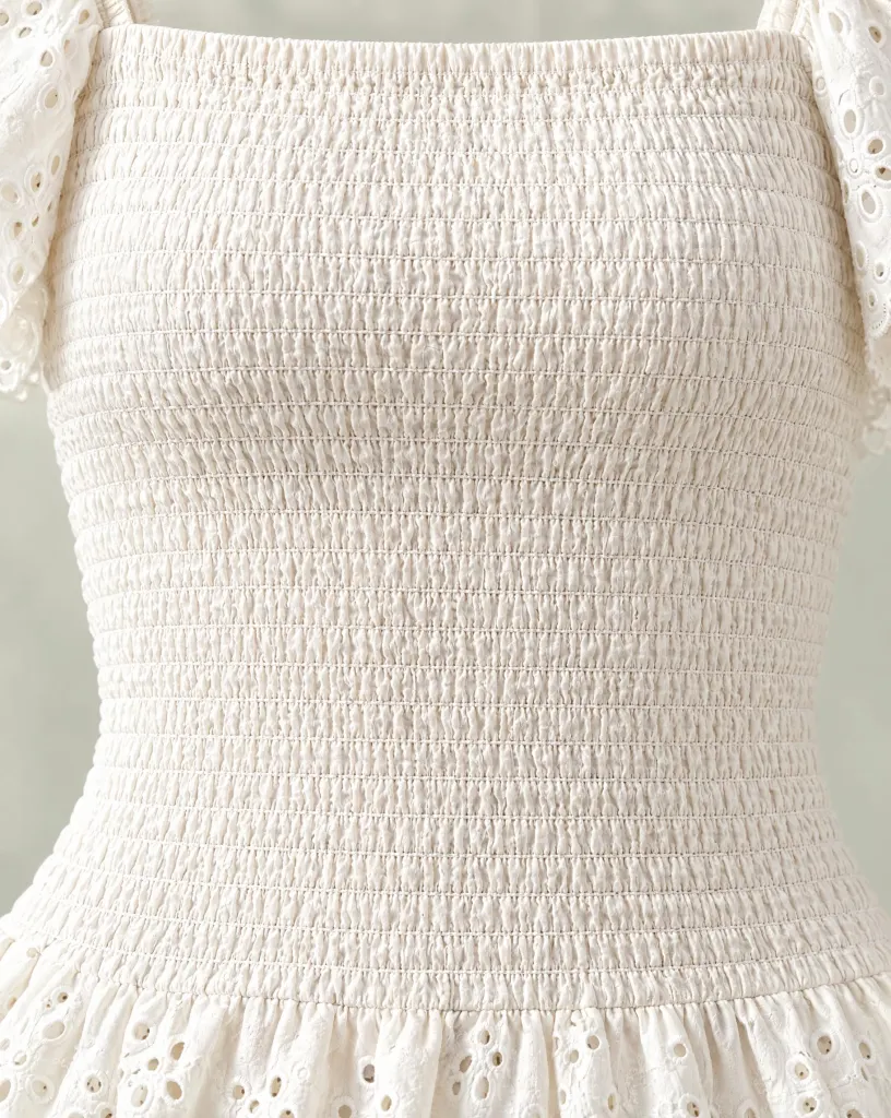 Close-up of the lattice smocked top embroidery and finishing
