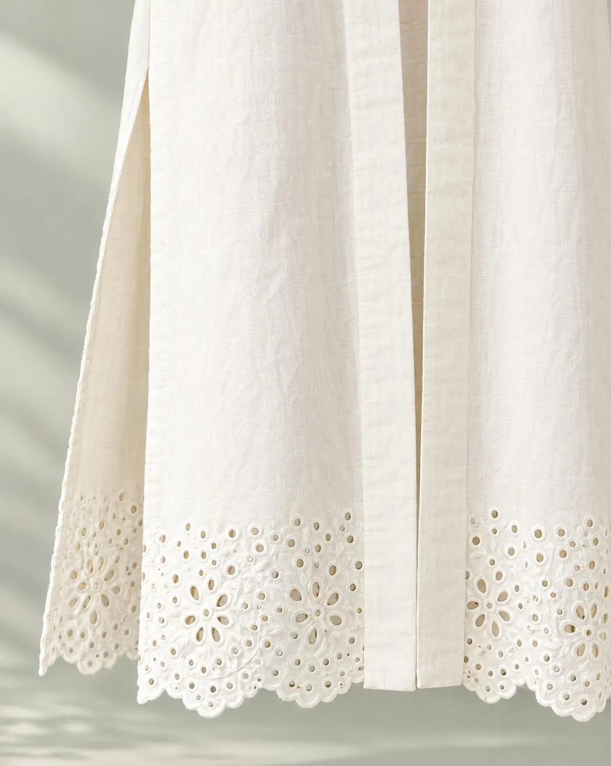 Close-up of the long duster layer embroidery and finishing