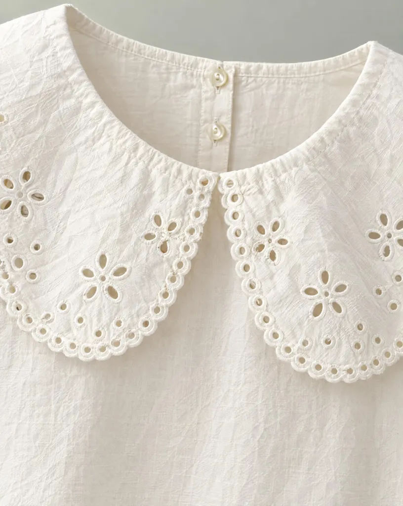 Close-up of the meadow big-collar blouse embroidery and finishing