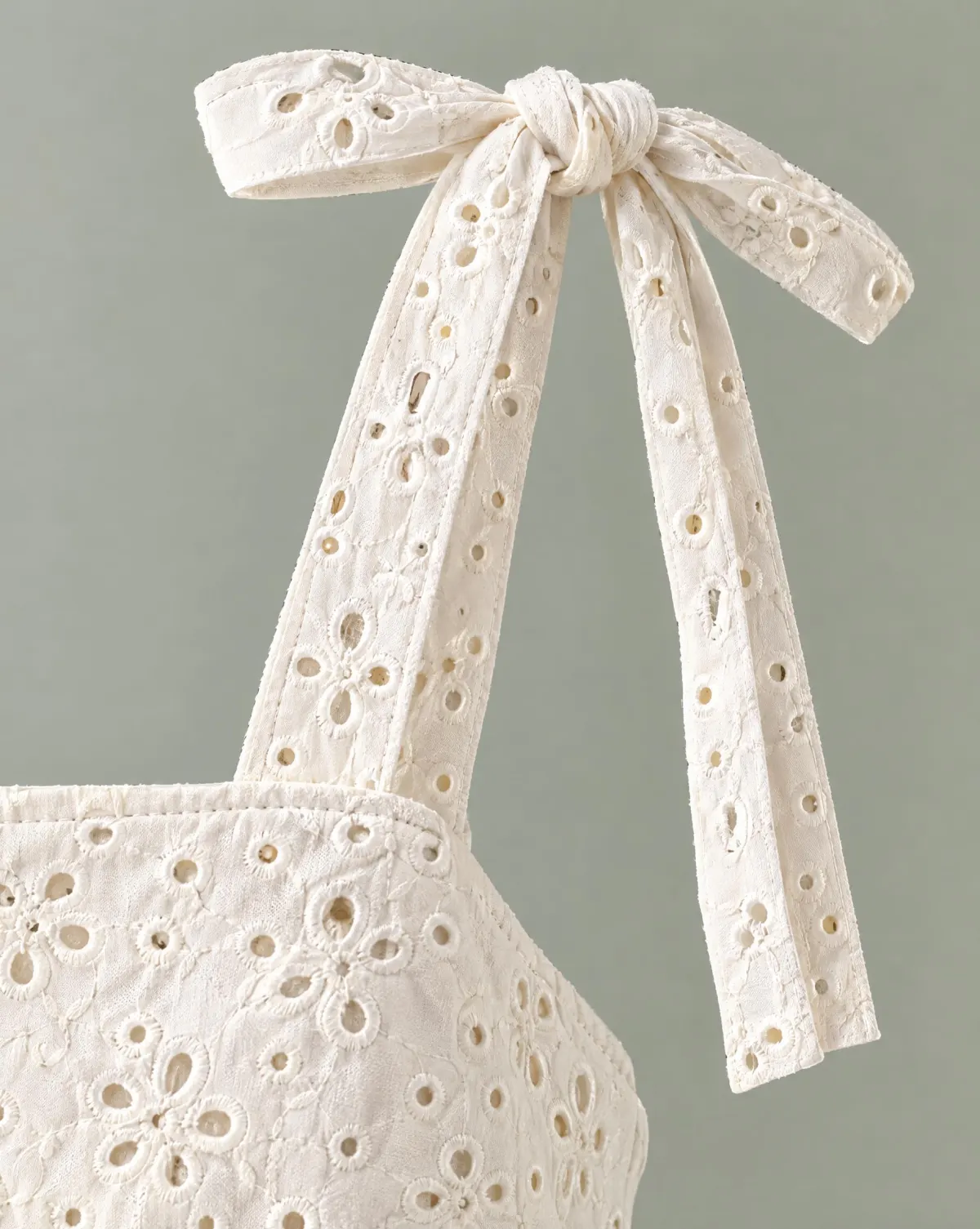 Close-up of the morning tie-shoulder top embroidery and finishing