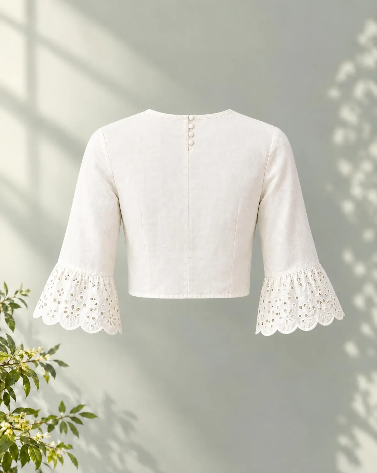 Petal Scallop-Cuff Crop Top in white, back view