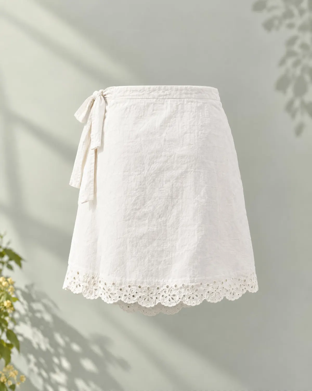 Petal Wrap Mini Skirt in white, back view