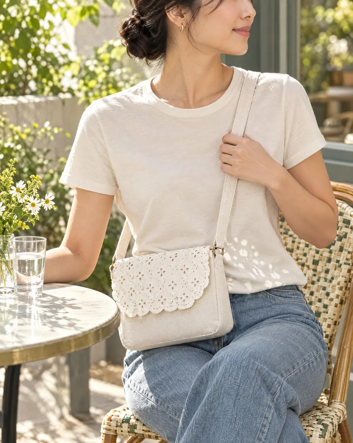 Scallop-Flap Crossbody in white, shown in use