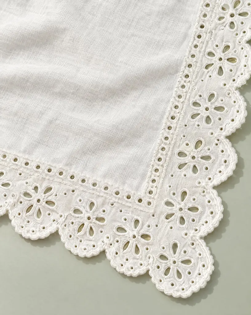 Close-up of the scallop hair scarf embroidery and finishing