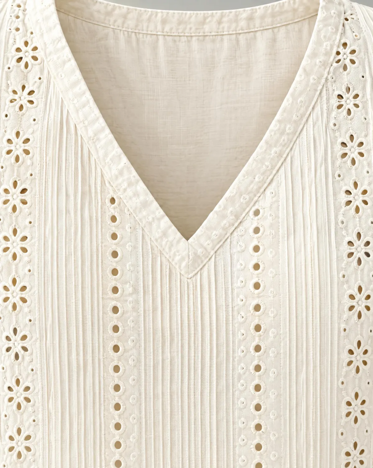 Close-up of the sunroom pintuck top embroidery and finishing